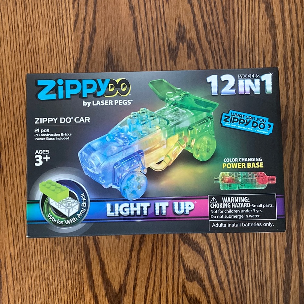 NIB. ZippyDo Laser Pegs 12 in 1 building kit